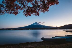 This serene landscape showcases Mount Fuji in the distance, framed by a tranquil lake and a tree with autumnal leaves. Just as this view captures the essence of Japan's natural beauty, U.S. companies seeking Japanese clients on LinkedIn need to capture the essence of their target market. "How U.S. Companies Can Find Japanese Clients on LinkedIn" offers insights into leveraging the platform to connect with potential Japanese clients, navigating cultural nuances, and using LinkedIn's features to stand out in the Japanese business landscape.